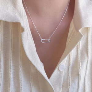 Elegant 925 sterling silver safety pin necklace with sparkling zirconia stones