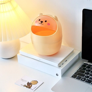 Cute bear-shaped mini desktop trash can with pink flip lid for office and home storage