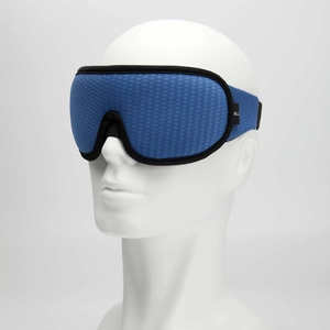 Close-up of blue 3D breathable sleep mask showing knit fabric texture and adjustable strap