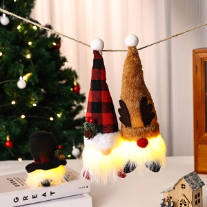 Hanging glowing Christmas gnomes with LED lights in red plaid and reindeer styles