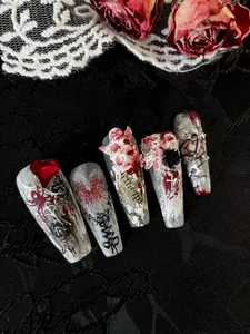 Gothic nail art with marble texture, 3D skull and spider web on long coffin shape
