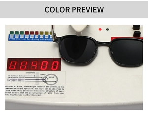 UV400 protection testing on black rectangular sunglasses with digital meter display