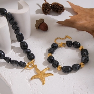 Irregular black resin necklace and bracelet set with golden starfish pendant jewelry