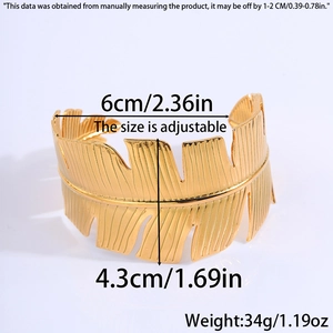 Detail view of adjustable gold leaf cuff bracelet with dimensions 4.3cm height and 6cm width