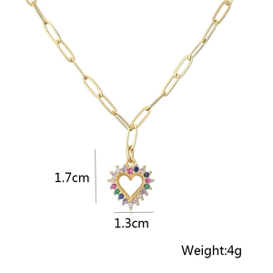 Detail of 18K gold heart pendant with colorful zircons, size 1.7cm and 4g weight
