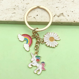 Cute rainbow unicorn keychain with daisy charm in gold-plated alloy for bags and keys