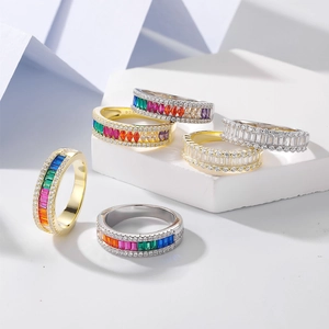 Minimalist S925 silver half-circle eternity ring with colorful gems on a white background