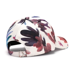 Floral print baseball cap in cream canvas with adjustable back metal buckle strap