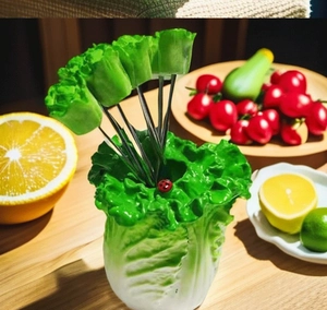 Creative cabbage-shaped holder with stainless steel fruit forks and ladybug detail