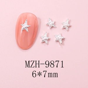 Macro shot of silver star nail charms with pearls, model MZH-9871, size 6x7mm