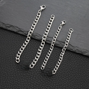 Detailed macro view of silver stainless steel couple bracelets with Forever always engraving