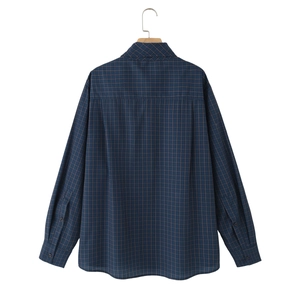 Navy blue plaid long sleeve casual shirt for women displayed on a wooden hanger