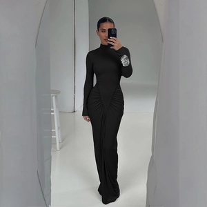 Detail of waist ruching on black high-neck long-sleeve slim fit maxi dress for women