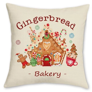 Christmas gingerbread house linen pillow cover with festive bakery pattern and cream base