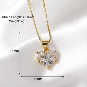 Detail showing 45+5cm gold chain necklace with a 13mm zircon heart pendant dimensions