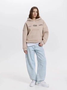 Women's oversized beige hoodie with street style graphic print and kangaroo pocket