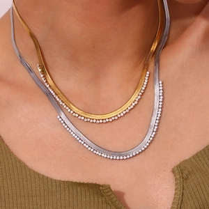 Flat herringbone snake chain necklace in gold and silver plating with cubic zirconia stones