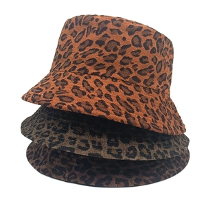 Set of three leopard print corduroy bucket hats in brown, tan, and grey stacked together