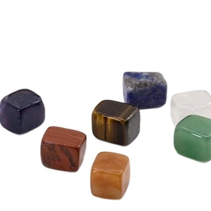 Polished natural crystal stone cubes in multiple colors including purple and green