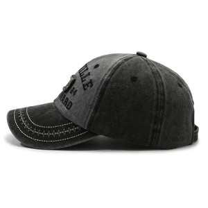 Washed black vintage baseball cap with side embroidery and star stitching detail