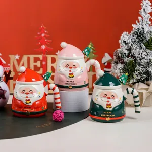 Festive Santa Claus ceramic mug set with lid and spoon in red, pink and green colors