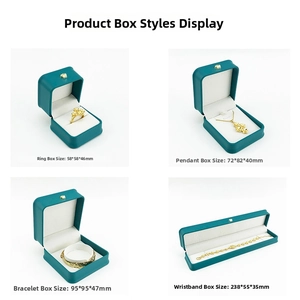 Detailed views of peacock green PU leather jewelry boxes with elegant gold crown logos