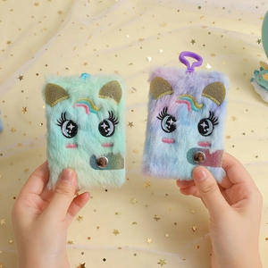 Mini taccuino unicorno di peluche con grandi occhi ricamati e orecchie glitterate