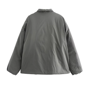 Back view of a dark gray loose kimono-style cotton jacket with textured fabric