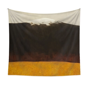 Detail of bohemian tapestry featuring abstract oil painting of a golden field and snow mountain