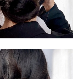 Gros plan d'épingles à cheveux argentées en U avec perles sur un chignon élégant