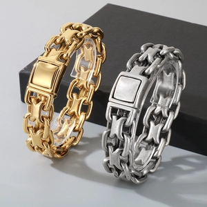 Detail of 20mm gold and silver stainless steel interwoven chain bracelets with square buckles