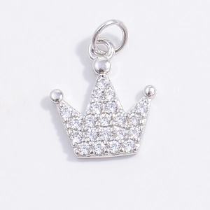 Detailed macro view of S925 silver crown pendant with shimmering white zircon stones