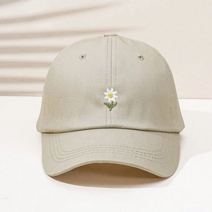 Khaki canvas baseball cap with white daisy embroidery for outdoor sun protection