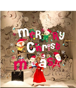 Detail of Merry Christmas window stickers featuring colorful Santa, fox, and deer patterns