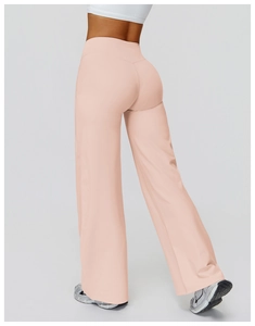 Back view of high-waist peach yoga wide-leg pants showing seamless lifting effect