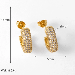 Detail view of 18K gold-plated geometric hoop earrings with cubic zircon inlay