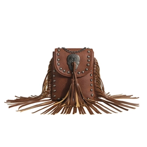 Brown faux leather fringe crossbody bag with silver studs and metal skull buckle detail