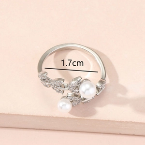 Silver open ring with leaf design, pearls and zircon, showing 1.7cm inner diameter