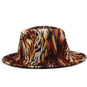 Detailed close-up of tiger print fedora hat featuring wool felt texture and classic crown