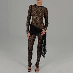 Detailed view of the intricate floral lace pattern on long sleeve sheer black bodysuit