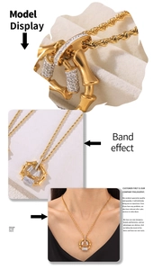 Detail of bamboo joint pendant necklace with rope chain and sparkling zircons in gold