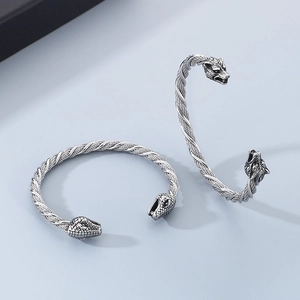 Bracelets joncs vintage en acier inoxydable avec têtes de loup et serpent entrelacées