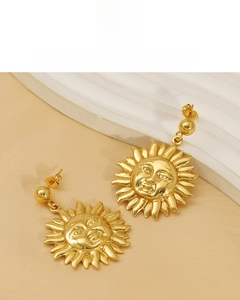 Detail of 18K gold-plated sunflower face earrings with vintage metallic relief texture