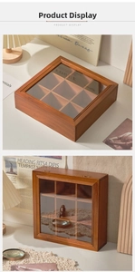 Detail of vintage 9-grid wooden storage box with glass lid and retro props on a desk