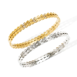 Leaf shaped 18K gold and silver plated stainless steel bracelets with micro-set zircons
