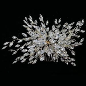 Handmade bridal hair comb with silver marquise crystal floral design on black background