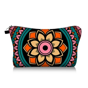 Detailed view of the vibrant mandala print cosmetic bag with secure top zipper closure