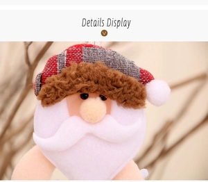 Detail of plush Santa Claus ornament featuring red grey plaid hat and white felt beard