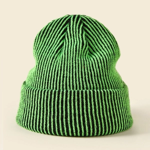 Winter rib-knit beanie with green and black vertical stripes and wide cuffed brim