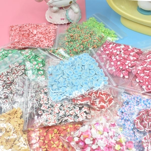 Colorful mixed polymer clay slices for DIY crafts and nail art in transparent bags